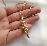 Image result for Woman Wearing Angel Necklace