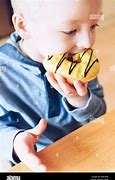 Image result for Kids Eating a Dount