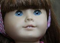 Image result for Doll with Blue Eyes and Brown Hair