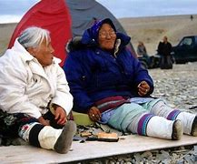 Image result for Inuit Mother Cooking