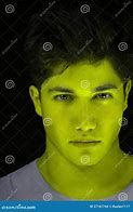 Image result for Man with Bronze Skin and Green Eyes