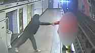 Shocking moment homeless man pushes postman onto Tube tracks in front of oncoming train