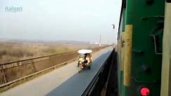 47 UP رحمٰن بابا express with the lead of Pha 20 8301 speedy Crossing Jehlum bridge and Jehlum Railway station.