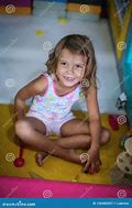 Image result for A Toddler Girl Inside Play