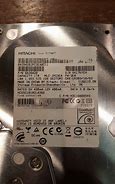 Image result for Hitachi HDD Hidden Screw