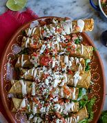 Image result for Mexican Beef Flautas