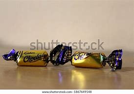 Image result for Red Eclairs by Cadbury