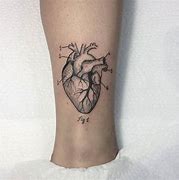 Image result for Anatomical Heart and Gear Tattoo