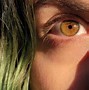 Image result for Green Eyes with Yellow Star