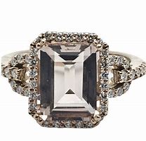 Image result for Pear and Emerald Cut Diamond Ring