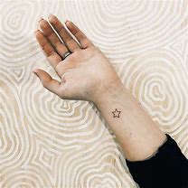 Image result for Small Star Tattoos On Wrist