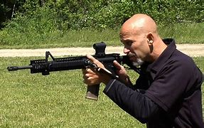 Image result for Ant Holding Rifle