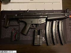 Image result for MP5 Airsoft Gun