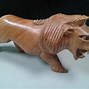 Image result for Wood Carved Animals