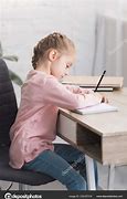 Image result for Kid Sitting at Desk