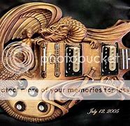 Image result for Wood Carved Guitars