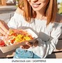 Image result for Picture of Girl Eat a Delicious Burrito