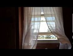 Image result for Curtains Blowing Int He Wind