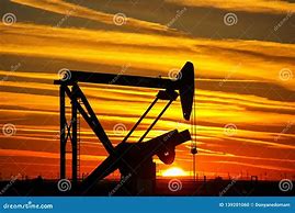 Image result for oil field pump jack sunset