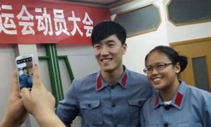 Image result for Liu Xiang in Suit