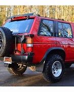 Image result for 1995 Nissan Pathfinder Xe Red