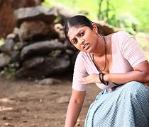 Image result for Varnakazhchakal Movie