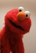 Image result for Sesame Place Elmo Puppet