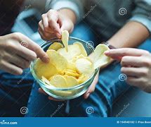 Image result for Goofy Eating Chips