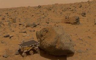 Image result for Human Holding a Pathfinder Mars Rover