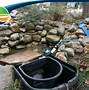 Image result for Koi Pond Bottom Drain Cleaning