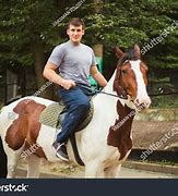 Image result for Guy Riding a Horse