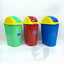 Image result for Tipsy Trash Can