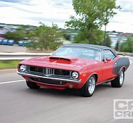 Image result for Orange Plymouth Barracuda