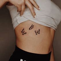 Image result for Simple Butterfly Rib Tattoos