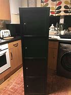 Image result for Four-Door Cupboard