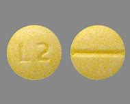 Image result for Round Yellow Pill with L On It