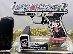 Image result for Hello Kitty 9Mm Pistol