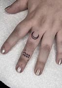 Image result for Aquarius Finger Tattoo