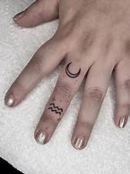 Image result for Aquarius Ring Finger Tattoo