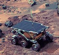 Image result for Human Holding a Pathfinder Mars Rover