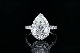 Image result for Pear Engagement Rings with Halo