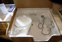 Image result for Pop Up Campers with Toilet and Shower