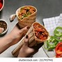 Image result for Handing Girl Burrito