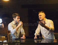 Image result for Guys Talking and Drinking at Bar