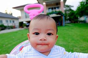 Image result for Cute Baby in Garden