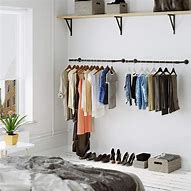 Image result for Vertical Wall Mount Clothes Rack