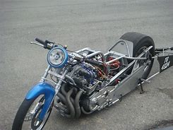 Image result for Kawasaki Drag Bike Smoking the Tire