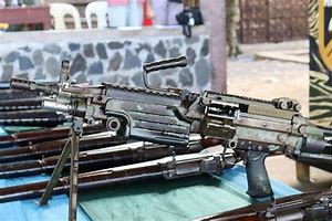 Image result for Stacks of Surrendered Guns