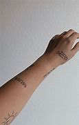 Image result for Small Upper Arm Tattoos