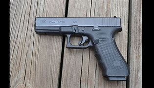 Image result for 9Mm Pistol G17